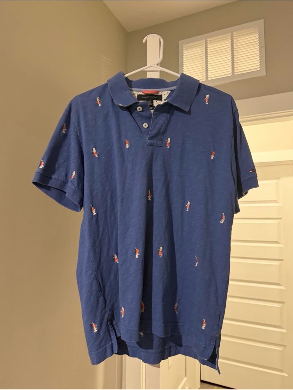 Tommy Hilfiger Blue Polo with Embroidered Hula Dancers